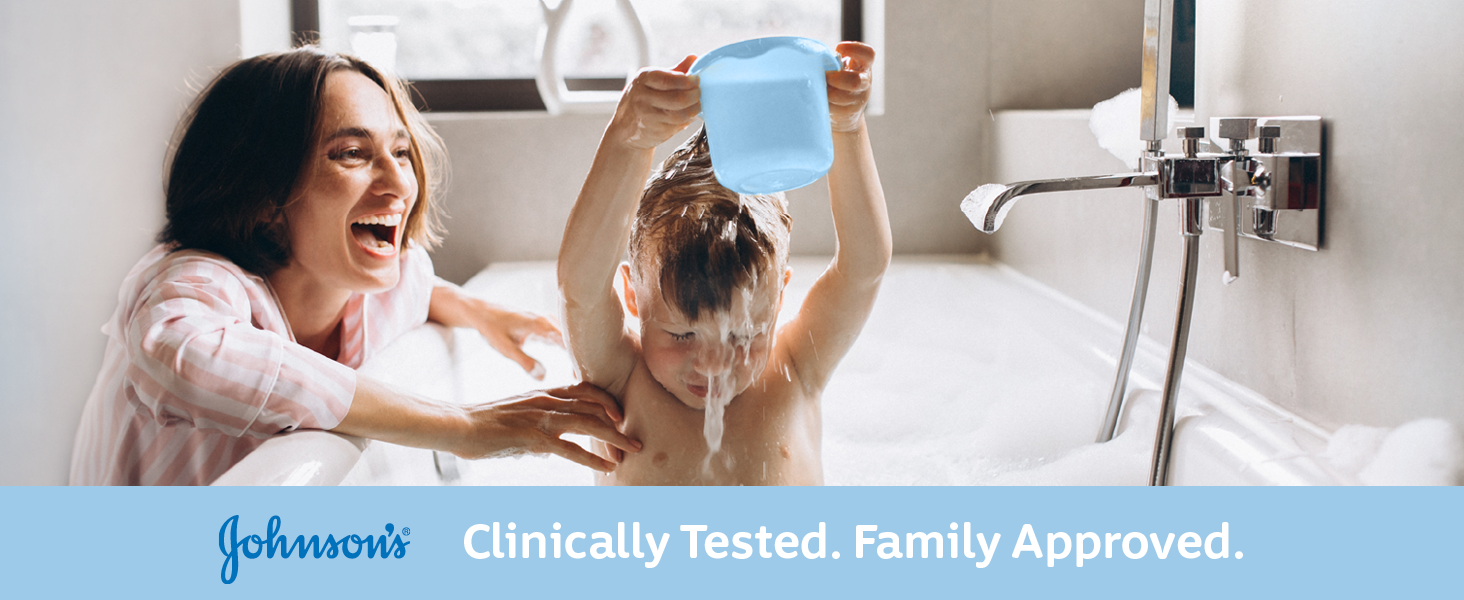 Smiling mother bathing her child with clinically tested Johnson's Baby Bubble Bath